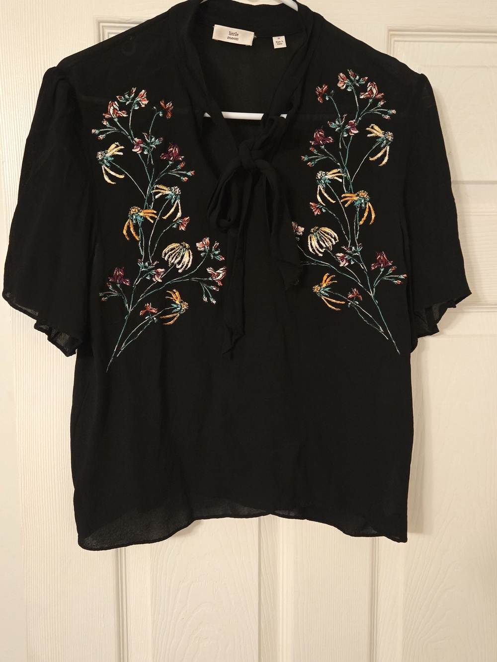 Little Moon Black Floral Embroidered Tie-Neck Blouse From Aritzia